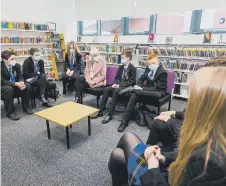  ?? ?? Pupils with Catherine Hearne, of Together for Children. Pic Elliot Nichol