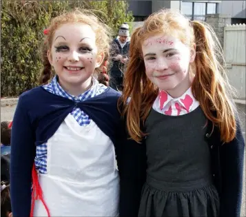  ??  ?? Faye Sheil and Ella Casey enjoying the Halloween Fun Run in the Educate Together School on Friday afternoon.