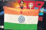  ?? UPPA ?? ■ Nidhi Singh Patel poses after winning a silver medal.