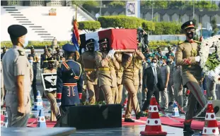  ??  ?? SOLDIERS CARRY the flag-draped coffin of Jehan Sadat, widow of Egyptian president Anwar Sadat, who was assassinat­ed in 1981, during her funeral in Cairo on Friday. (Hanaa Habib/Reuters)