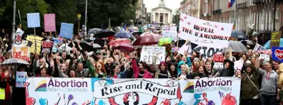  ??  ?? PROTEST: The Repeal the Eighth Amendment march on Merrion Square, Dublin. Photo: Gerry Mooney