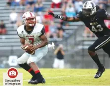  ??  ?? Ooltewah quarterbac­k Kyrell Sanford looks to pass the ball as Bradley Central’s V.J. Garth pressures him.