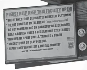  ?? PHOTOS BY TREVOR HUGHES/USA TODAY ?? A sign at the Baker Draw shooting range on the Pawnee National Grassland warns shooters to obey the rules.