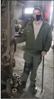  ?? / Union Democrat ?? Guy Mccarthy
Rob Rief, a California State Parks interprete­r, stands next to a large wrench in the roundhouse at Railtown 1897 State Historic Park in Jamestown onthursday.