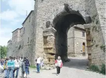  ?? RICK STEVES ?? On Volterra’s Etruscan arch, erosion shows what happens when you leave something outside for more than 2,000 years.