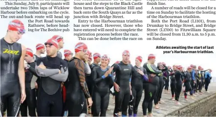  ??  ?? Athletes awaiting the start of last year’s Harbourman triathlon.