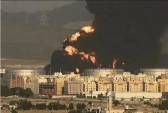  ?? Hassan Ammar / Associated Press ?? Smoke rises March 25 in Jiddah, Saudi Arabia, from a burning oil depot after an attack by Yemen’s Houthi rebels. The two-month truce was to take effect Saturday evening.