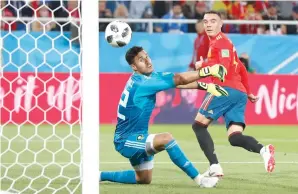  ?? AP ?? Spain’s Iago Aspas scores his side’s second goal past Morocco goalkeeper Monir El Kajoui. —