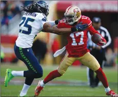  ?? NHAT V. MEYER/TRIBUNE NEWS SERVICE ?? San Francisco 49ers wide receiver Jeremy Kerley (17) runs with the ball after a catch against the Seattle Seahawks' Richard Sherman (25) in the first quarter at Levi's Stadium in Santa Clara on Sunday.