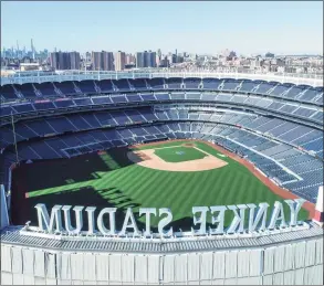  ?? Associated Press file photo ?? This March 26, 2020 file photo shows an empty Yankee Stadium.