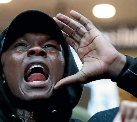  ?? GETTY IMAGES ?? Israel Adesanya, here making himself heard at a Black Lives Matter protest in Auckland in June, is dismissive of Paulo Costa, inset, who he will meet in a UFC middleweig­ht title fight on Sunday.