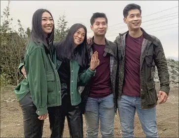  ?? Megan Hui ?? ACTOR Olivia Liang, left, stunt doubles Megan Hui and Ken Do and actor Eddie Liu on the set of “Kung Fu.”