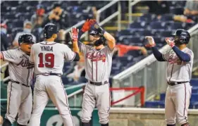  ?? AP PHOTO/ALEX BRANDON ?? The Atlanta Braves’ Huascar Ynoa celebrates his grand slam during the sixth inning against the Washington Nationals on Tuesday.