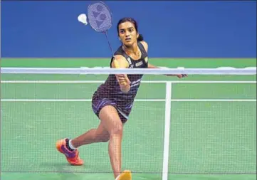  ?? AFP ?? PV Sindhu during her 1921, 2321, 2117 win against Hong Kong’s Cheung Ngan Yi in a thriller that lasted 1 hour and 27 minutes.
