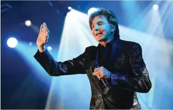  ?? (Emma McIntyre/Getty Images for Celebrity Fight Night/TNS) ?? BARRY MANILOW performs in, 2019, in Phoenix, Arizona.