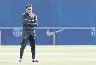  ?? Quique Garcia / EFE ?? Xavi, meditativo en la ciudad deportiva ante el partido contra el PSG