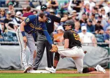  ?? Ashley Landis/Associated Press ?? Bryce Johnson, right, is safe after stealing third. The Giants plan to take advantage of rule changes to run more this season.