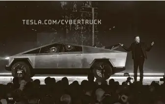  ?? Frederic J. Brown / AFP via Getty Images ?? Co-founder and CEO Elon Musk unveils Tesla’s Cybertruck in November 2019. Musk recently has promised a battery that could run for a “million miles” before being replaced.