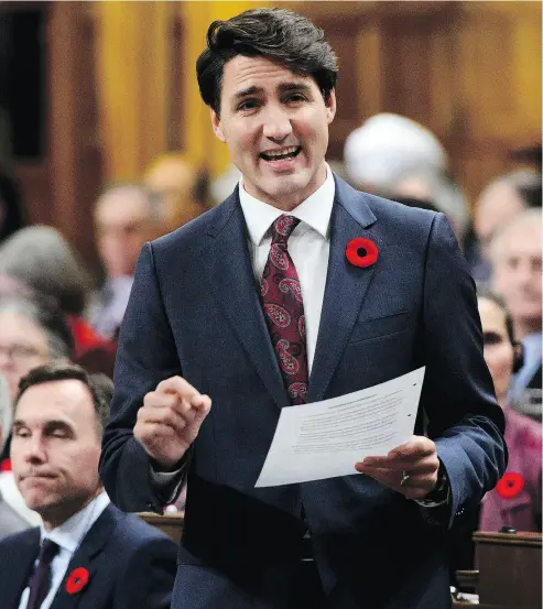  ?? SEAN KILPATRICK / THE CANADIAN PRESS ?? Prime Minister Justin Trudeau during question period in the Commons on Tuesday. Trudeau told CNN he would prefer to see U.S. tariffs on steel and aluminum lifted, but may sign a new trade deal even if they stay put.