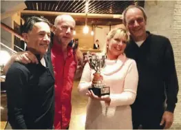  ??  ?? Racing Trophy Cruisers: Presented by Tanya English to sailing yacht Blade crew, Chris DeBoer, Dave Reid, and Hans Sleutjes