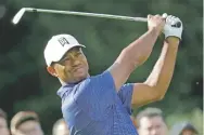  ?? JULIO CORTEZ/ASSOCIATED PRESS ?? Tiger Woods had a pair of birdies, a pair of bogeys, a lot of pars and a 71 on Thursday at the Northern Trust in Paramus, N.J. He is five shots behind and in a tie for 60th.