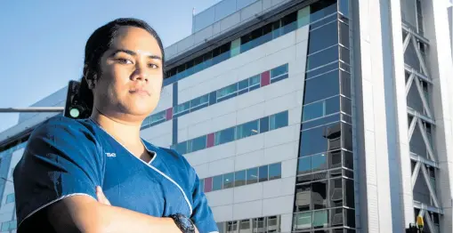  ??  ?? Registered nurse Mafile’o Talakai says the possibilit­y of no pay rise for three years makes nurses who worked through Covid-19 feel undervalue­d.