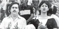  ?? AP ?? In this undated file photo, the late Pablo Escobar, former boss of the Medellin drug cartel, and his wife Maria Henao attend a soccer match in Bogota, Colombia. Escobar’s widow says in a new book she felt raped when at age 14 he forced her to have an abortion, and over time came to view him as a cruel psychopath.