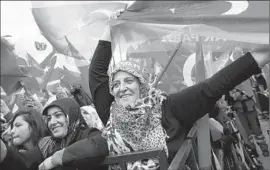  ?? Umit Bektas
Associated Press ?? IN ANKARA, supporters listen to Turkish Prime Minister Ahmet Davutoglu at a rally for the Justice and Developmen­t Party, or AKP, the day before the election.