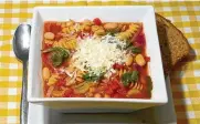  ?? LINDA GASSENHEIM­ER/TNS ?? Hearty Vegetable and Bean Soup is made in one pot and takes about 20 minutes from assembling the ingredient­s to cooking it.