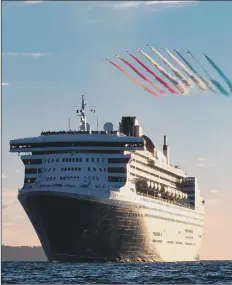  ?? Picture Christophe­r Ison ?? TARGET The Red Arrows fly over Queen Mary 2 in the Solent in 2018.