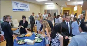  ?? PHOTO PROVIDED. ?? Event-goers check out the new facility at a grand opening event for Fresenius Kidney Care in North Greenbush.