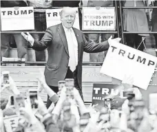  ?? STEVE HELBER, AP ?? Campaignin­g Monday in Radford, Va., Donald Trump says he’ll do “phenomenal­ly with the African Americans.”