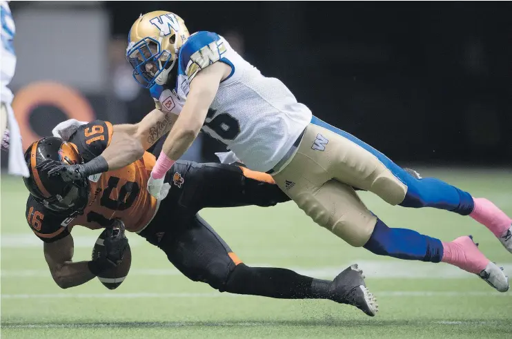  ?? — THE CANADIAN PRESS FILES ?? Winnipeg Blue Bombers safety Taylor Loffler made plenty of big hits on players like B.C.’s Bryan Burnham during his first season in the league.