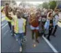  ?? KEITH SRAKOCIC - THE AP ?? People start a protest march against the shooting death of Antwon Rose Jr. on Tuesday, in Pittsburgh. Rose was fatally shot by a police officer seconds after he fled a traffic stop June 19, in the suburb of East Pittsburgh.