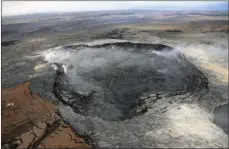  ?? U.S. GEOLOGICAL SURVEY VIA AP ?? In this April 23 photo provided by the U.S. Geological Survey, Kilauea Volcano’s Puu Oo vent is shown in Hawaii Volcanoes National Park on the Big Island.