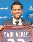  ??  ?? Dani Alves signs for PSG.