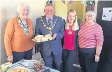  ??  ?? Mayor Coun Peter Britcliffe and Mayoress Sara Britcliffe at the coffee morning at Rhyddings Methodist Church, Oswaldtwis­tle