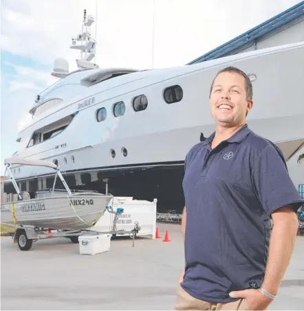  ?? Picture: GLENN HAMPSON ?? Captain Dan Farrell in front of the 42m motor yacht
De Lisle III at The Boat Works’ new superyacht yard.