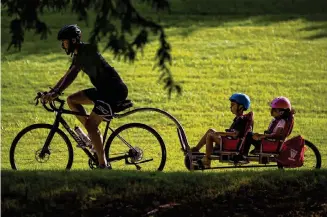  ?? Staff file photo ?? People enjoy a bicycle ride at Buffalo Bayou Park on Sept. 4, 2021. A new report by Streetligh­t found that between 2019 and 2022, the annual average daily bicycle trips per year grew 37%.