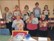  ??  ?? Some of the ladies with their crafts.