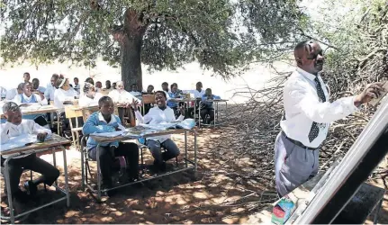  ?? / ANTONIO MUCHAVE ?? Jacob Rapudi’s days of teaching pupils under trees at Makangwane Secondary School may be over after the Limpopo High Court in Polokwane ordered the province to provide classrooms.