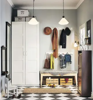  ?? PHOTO COURTESY OF IKEA ?? If you have the luxury of a mudroom, furnish it with seating, storage space, and a collection of hooks for scarves, backpacks, hats and the like. And if there’s room for an armoire that allows you to hang up coats and jackets, so much the better.