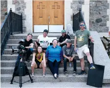  ??  ?? Cast and crew of the film “Nolan: Here Nor There,” take a break from filming the movie in Fort Qu’Appelle. Photo by Dustan Hlady