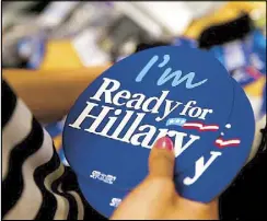  ?? REUTERS/AP ?? 3 MILLION AND COUNTING: Hillary Clinton’s new logo is pictured in this April 12, 2015 screen capture from her Twitter page, showing 3.28 million followers so far. Inset shows Hillary apparel and accessorie­s being packed in Arlington, Virginia.