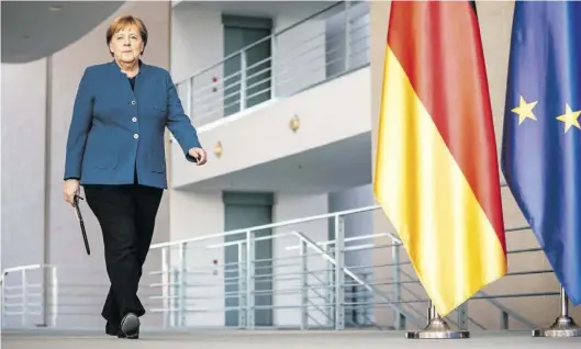  ?? DPA-BILD: KAPPELER ?? Von der Pressekonf­erenz ging es für Bundeskanz­lerin Angela Merkel direkt in die häusliche Quarantäne.