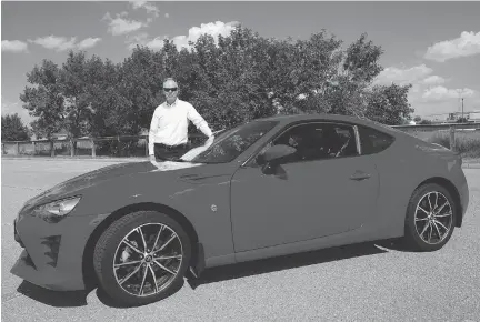  ?? LEAH HENNEL ?? Gary Rokosh with the 2017 Toyota 86, a sports car he says the automaker “nailed” in its execution.