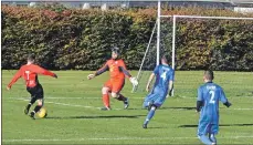  ??  ?? Johnny Sloss opens the scoring with a left-footed kick at goal.