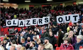  ?? Photograph: Martin Rickett/PA ?? Manchester United fans protest against the Glazers’ ownership at Old Trafford in April.
