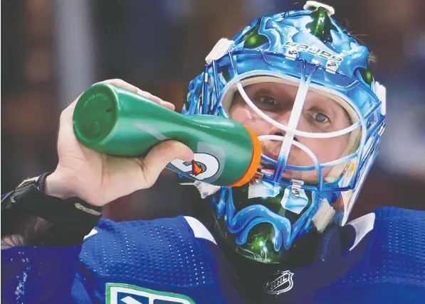  ?? —THE CANADIAN PRESS ?? Because of the current travel ban on non-essential personnel, players such as Vancouver Canucks goaltender Jacob Markstrom would have to receive permission to return to Canada and then isolate in quarantine for 14 days before ever stepping on the ice here again.