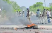  ?? HT FILE/MUJEEB FARUQUI ?? Police patrol the MhowNeemuc­h highway after a farmers’ protests in Mandsaur, Madhya Pradesh.